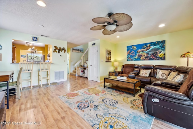 412 Sailfish Ave Unit 16, Cape Canaveral, FL 32920 - living room featuring stairway, a ceiling fan, wood finished floors, recessed lighting, and baseboards
