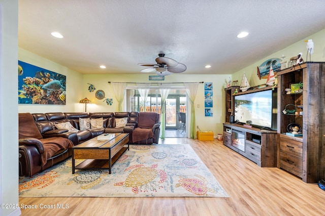 412 Sailfish Ave Unit 16, Cape Canaveral, FL 32920 - living area featuring ceiling fan, wood finished floors, and recessed lighting