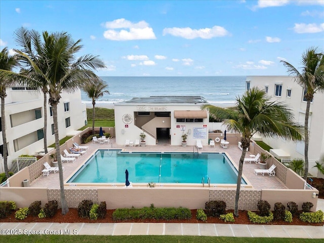 1950 Atlantic St Unit 223, Melbourne Beach, FL 32951 - community pool with a patio and a water view