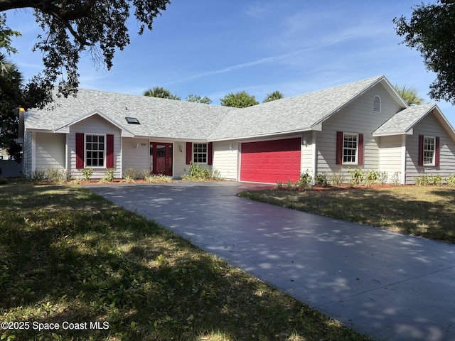 single story home with roof with shingles, a front yard, a garage, and driveway
