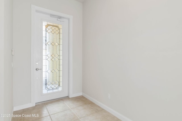 3547 Plume Way, Palm Bay, FL 32909 - foyer featuring light tile patterned floors and baseboards