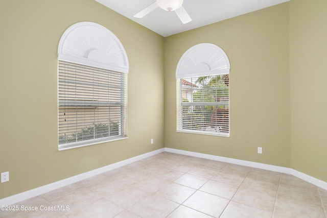 3547 Plume Way, Palm Bay, FL 32909 - tiled spare room with baseboards and a ceiling fan