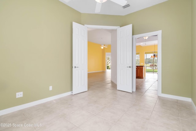 3547 Plume Way, Palm Bay, FL 32909 - spare room featuring light tile patterned floors, baseboards, visible vents, and ceiling fan