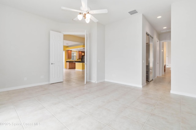 3547 Plume Way, Palm Bay, FL 32909 - empty room featuring light tile patterned flooring, visible vents, recessed lighting, a ceiling fan, and baseboards