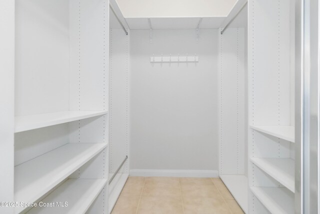 3547 Plume Way, Palm Bay, FL 32909 - spacious closet with light tile patterned floors