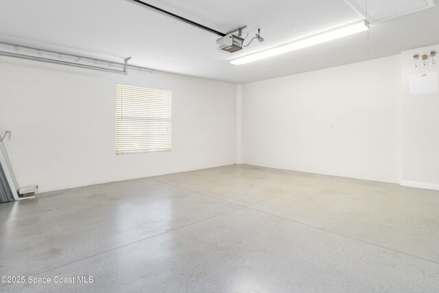 3547 Plume Way, Palm Bay, FL 32909 - garage featuring a garage door opener