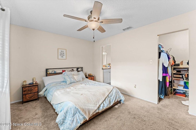 5970 Coker Ave, Cocoa, FL 32927 - bedroom featuring carpet flooring, baseboards, a ceiling fan, and a textured ceiling