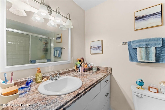 5970 Coker Ave, Cocoa, FL 32927 - full bathroom with a shower stall, vanity, and toilet