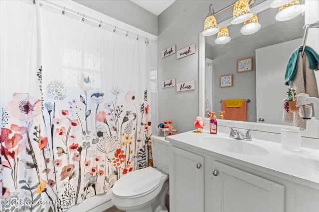 5970 Coker Ave, Cocoa, FL 32927 - bathroom featuring vanity, toilet, and a shower with curtain
