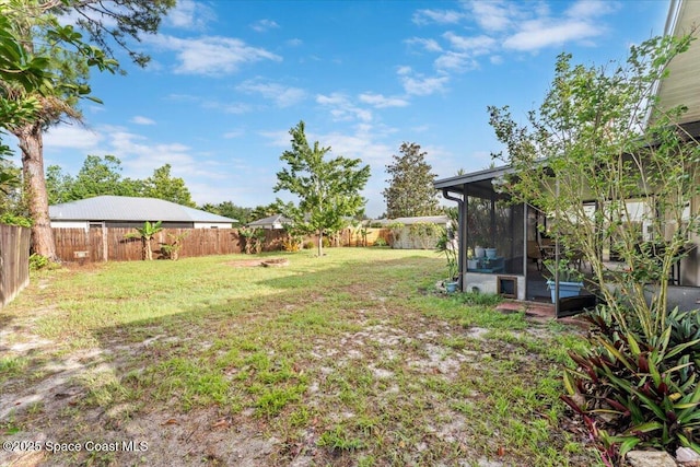 5970 Coker Ave, Cocoa, FL 32927 - view of yard featuring a sunroom