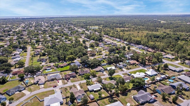 5970 Coker Ave, Cocoa, FL 32927 - aerial view of property's location featuring a forest and nearby suburban area