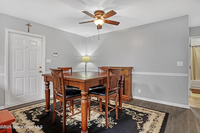 5280 Curtis Blvd, Cocoa, FL 32927 - dining area with a ceiling fan, wood finished floors, and baseboards