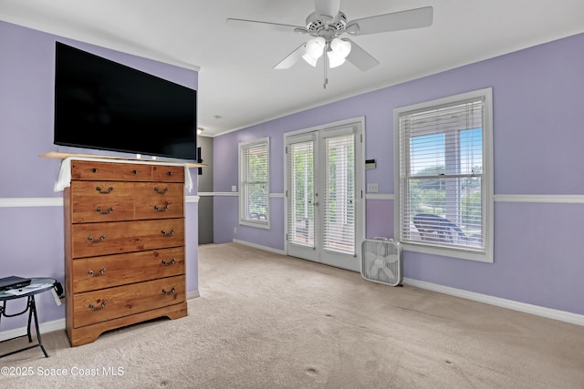 5280 Curtis Blvd, Cocoa, FL 32927 - carpeted bedroom featuring access to outside, baseboards, ceiling fan, and ornamental molding