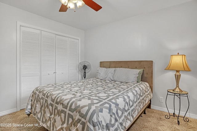 5280 Curtis Blvd, Cocoa, FL 32927 - carpeted bedroom with a closet, baseboards, and ceiling fan