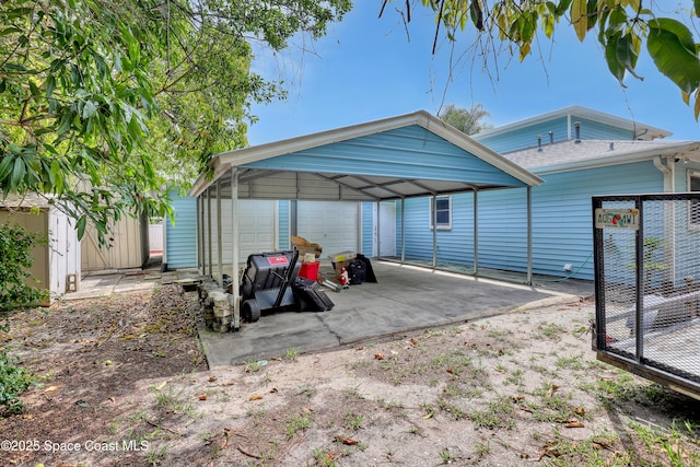 5280 Curtis Blvd, Cocoa, FL 32927 - view of car parking with a detached garage