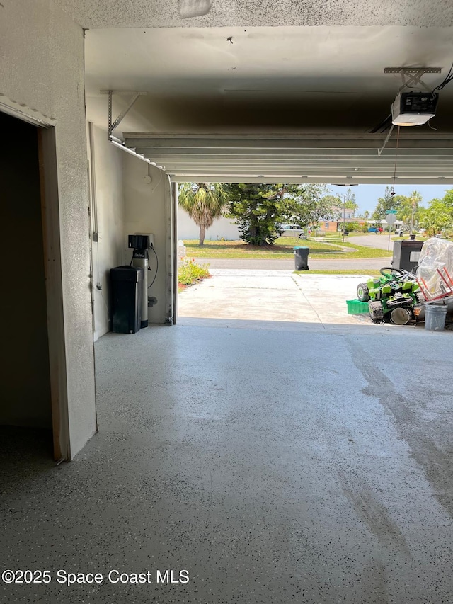 797 James Cir, Palm Bay, FL 32905 - garage with a garage door opener