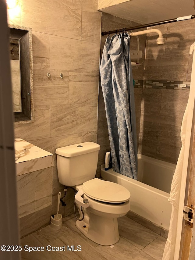 797 James Cir, Palm Bay, FL 32905 - full bathroom with shower / bath combo with shower curtain and toilet
