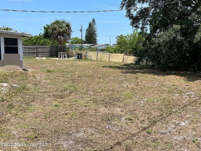 797 James Cir, Palm Bay, FL 32905 - view of yard with a playground