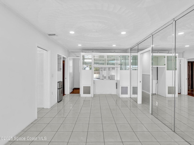 5118 Adams St, Hollywood, FL 33021 - interior space featuring light tile patterned floors, visible vents, and recessed lighting