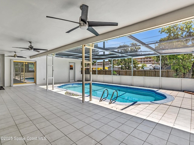 5118 Adams St, Hollywood, FL 33021 - view of pool featuring ceiling fan, a patio, and fence