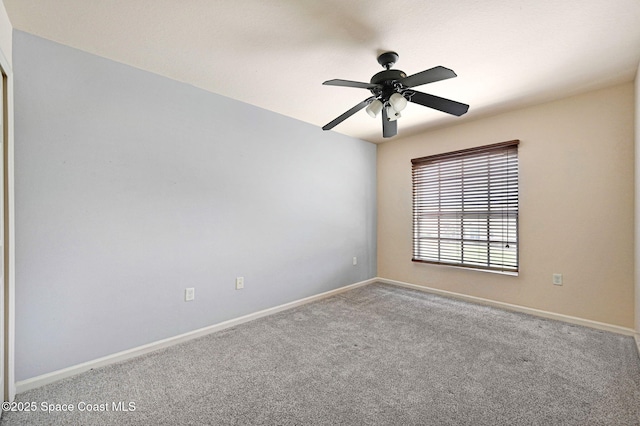 3202 Arden Cir, Melbourne, FL 32934 - spare room with baseboards, carpet floors, and ceiling fan