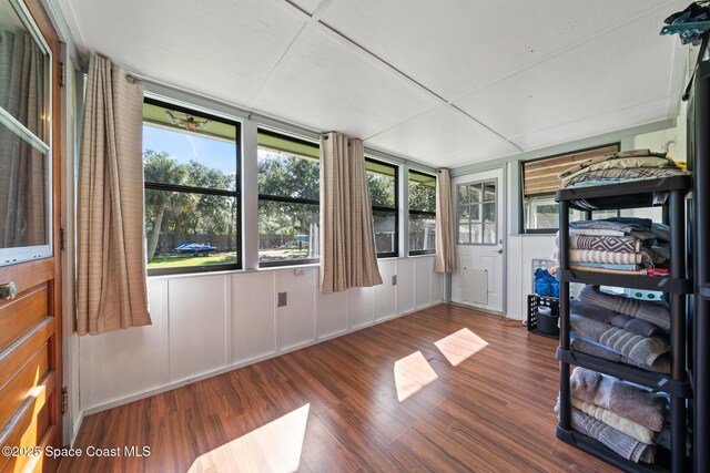 9633 Honeysuckle Dr, Sebastian, FL 32976 - sunroom with wood finished floors