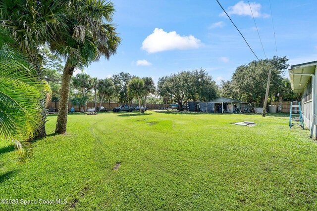 9633 Honeysuckle Dr, Sebastian, FL 32976 - view of yard with fence