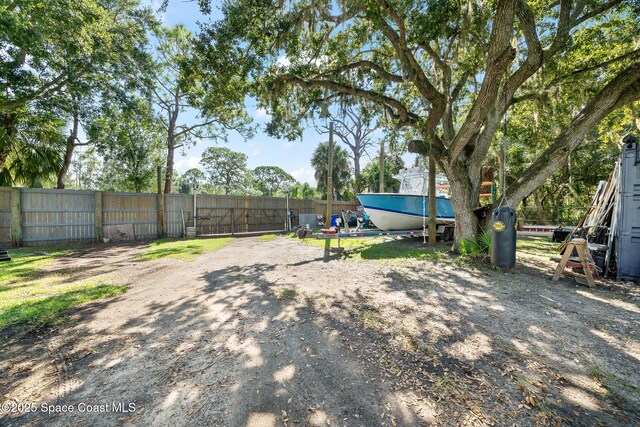 9633 Honeysuckle Dr, Sebastian, FL 32976 - view of yard with fence