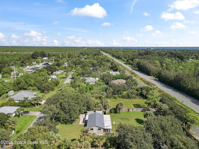 9633 Honeysuckle Dr, Sebastian, FL 32976 - aerial view with a view of trees