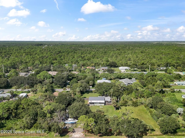 9633 Honeysuckle Dr, Sebastian, FL 32976 - aerial view featuring a view of trees