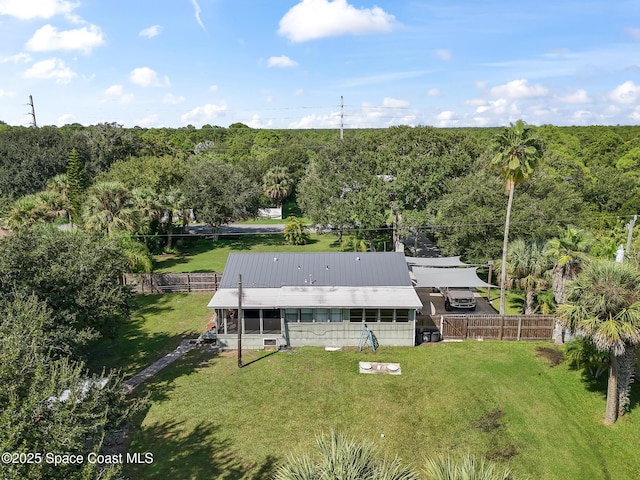 9633 Honeysuckle Dr, Sebastian, FL 32976 - birds eye view of property with a view of trees