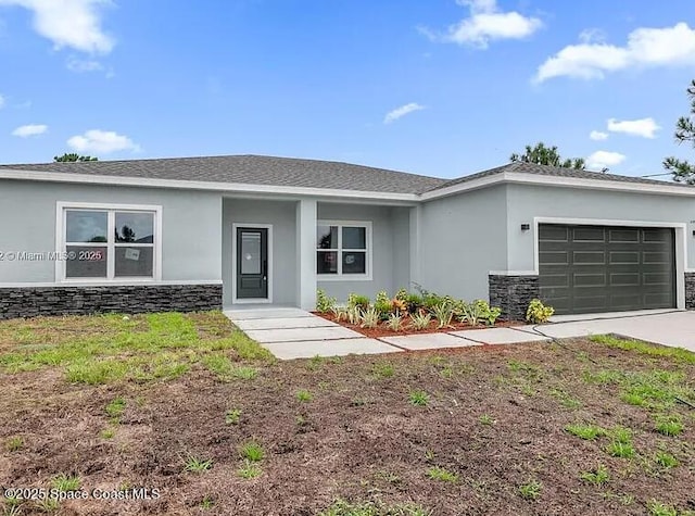 3195 Fitzpatrick Ave, Palm Bay, FL 32908 - single story home featuring an attached garage, concrete driveway, stucco siding, and stone siding