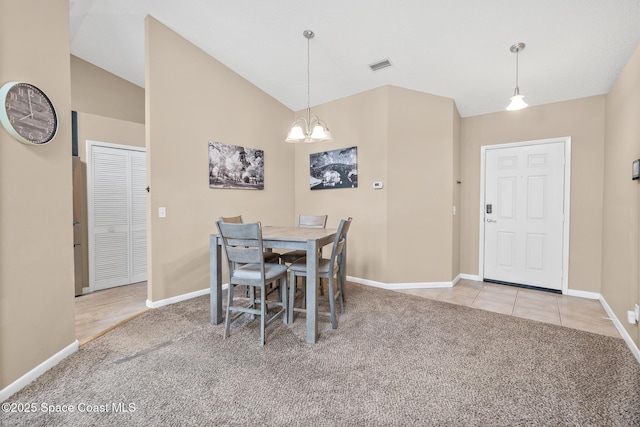 1265 Giralda Cir NW, Palm Bay, FL 32907 - carpeted dining area with a chandelier, baseboards, and vaulted ceiling