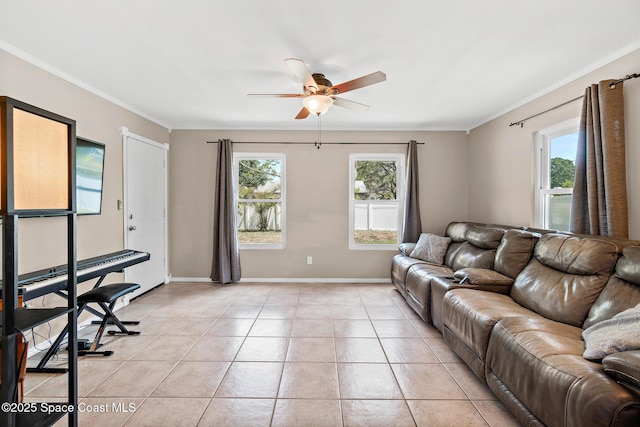 1265 Giralda Cir NW, Palm Bay, FL 32907 - living room with a ceiling fan, healthy amount of natural light, ornamental molding, light tile patterned floors, and baseboards