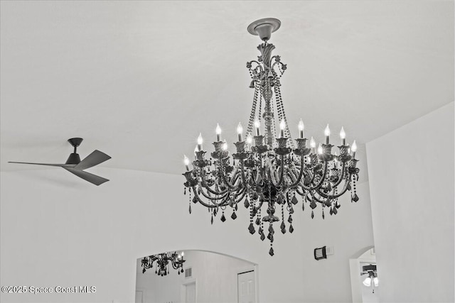 detailed view of arched walkways and a ceiling fan
