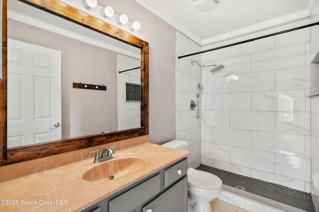 bathroom with crown molding, toilet, a stall shower, and vanity