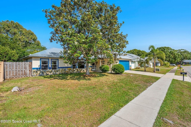 view of front of home featuring concrete driveway, an attached garage, and stucco siding