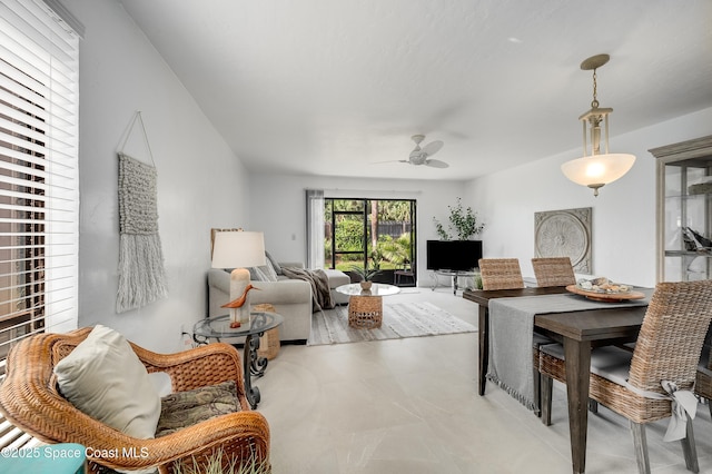 8 Cove Rd Unit 8-B, Melbourne Beach, FL 32951 - living area featuring a ceiling fan