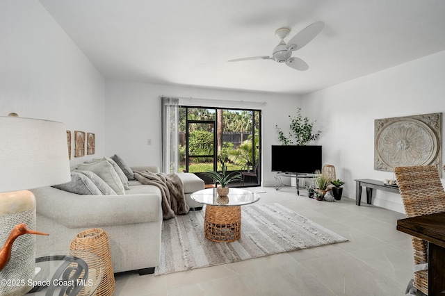 8 Cove Rd Unit 8-B, Melbourne Beach, FL 32951 - living room with ceiling fan and tile patterned flooring