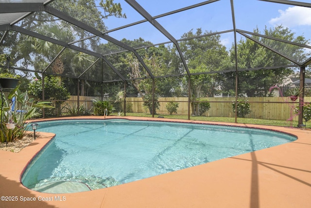 view of swimming pool with a patio area, a fenced backyard, and a fenced in pool