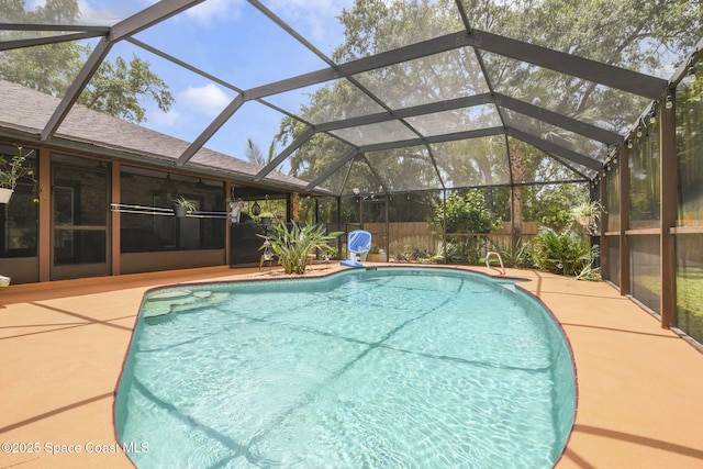 view of pool featuring a patio area, a fenced in pool, and a lanai