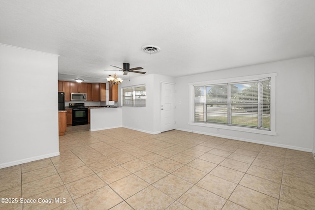 unfurnished living room with light tile patterned floors, baseboards, a chandelier, and ceiling fan