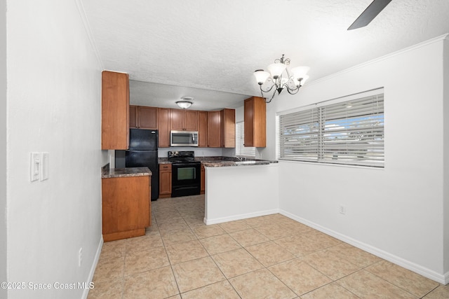 kitchen with black appliances, a textured ceiling, brown cabinetry, baseboards, and crown molding