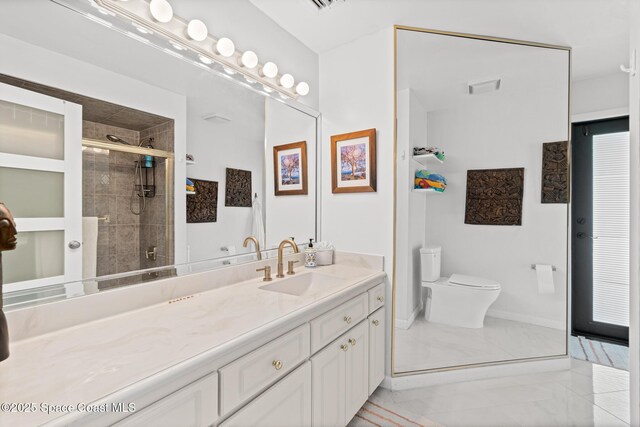 full bath with toilet, a stall shower, marble look tile flooring, and vanity