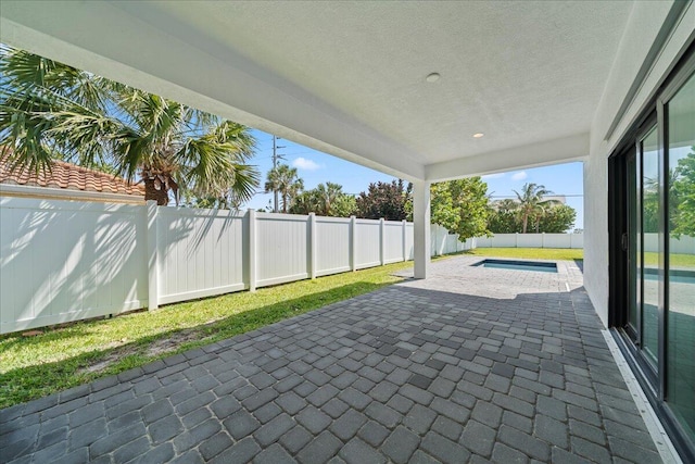 view of patio with a fenced backyard