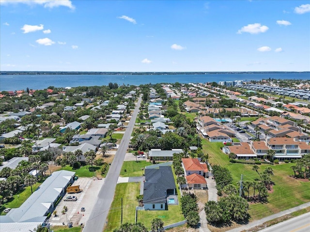aerial view with a water view and a residential view