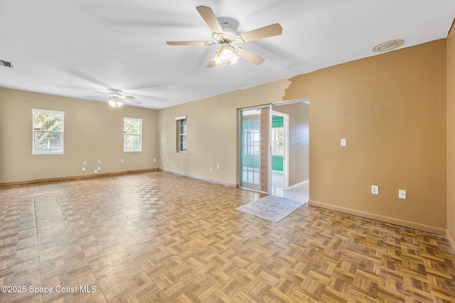 1554 Nona St NE, Palm Bay, FL 32907 - unfurnished room with a ceiling fan and baseboards