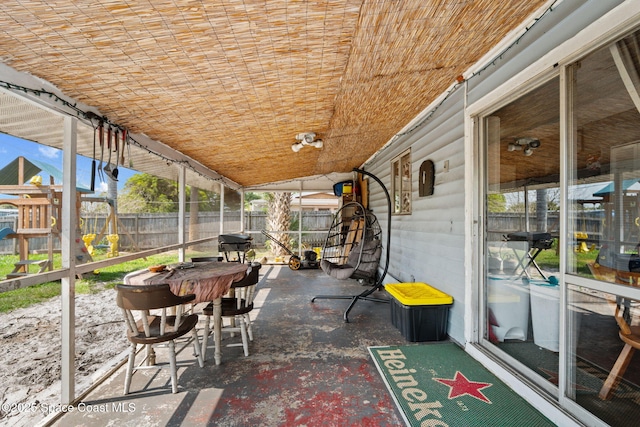 sunroom / solarium with lofted ceiling
