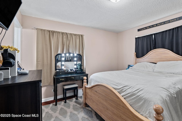bedroom with a textured ceiling