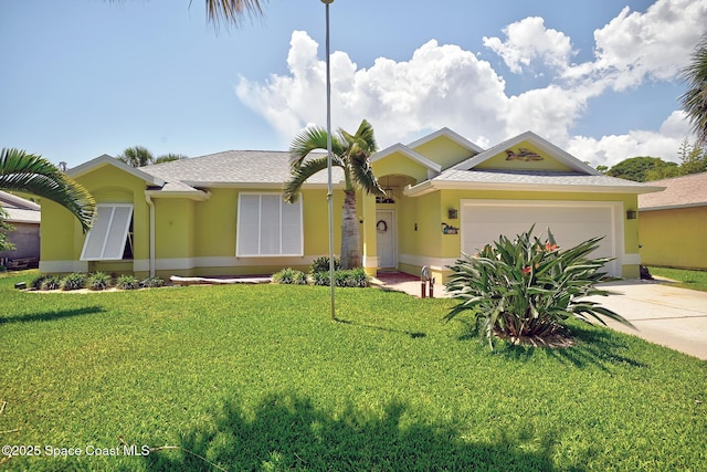 single story home with a garage, driveway, stucco siding, and a front yard